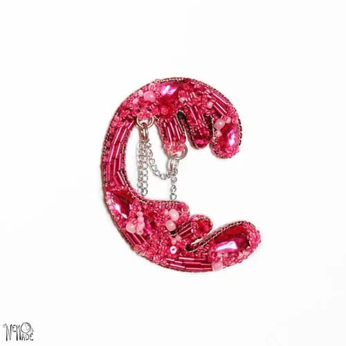 Pin "MÉTAMORPHOSE"