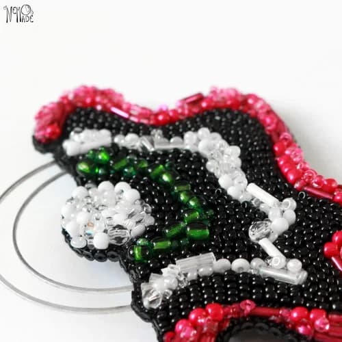 Broche "TINNITUS"