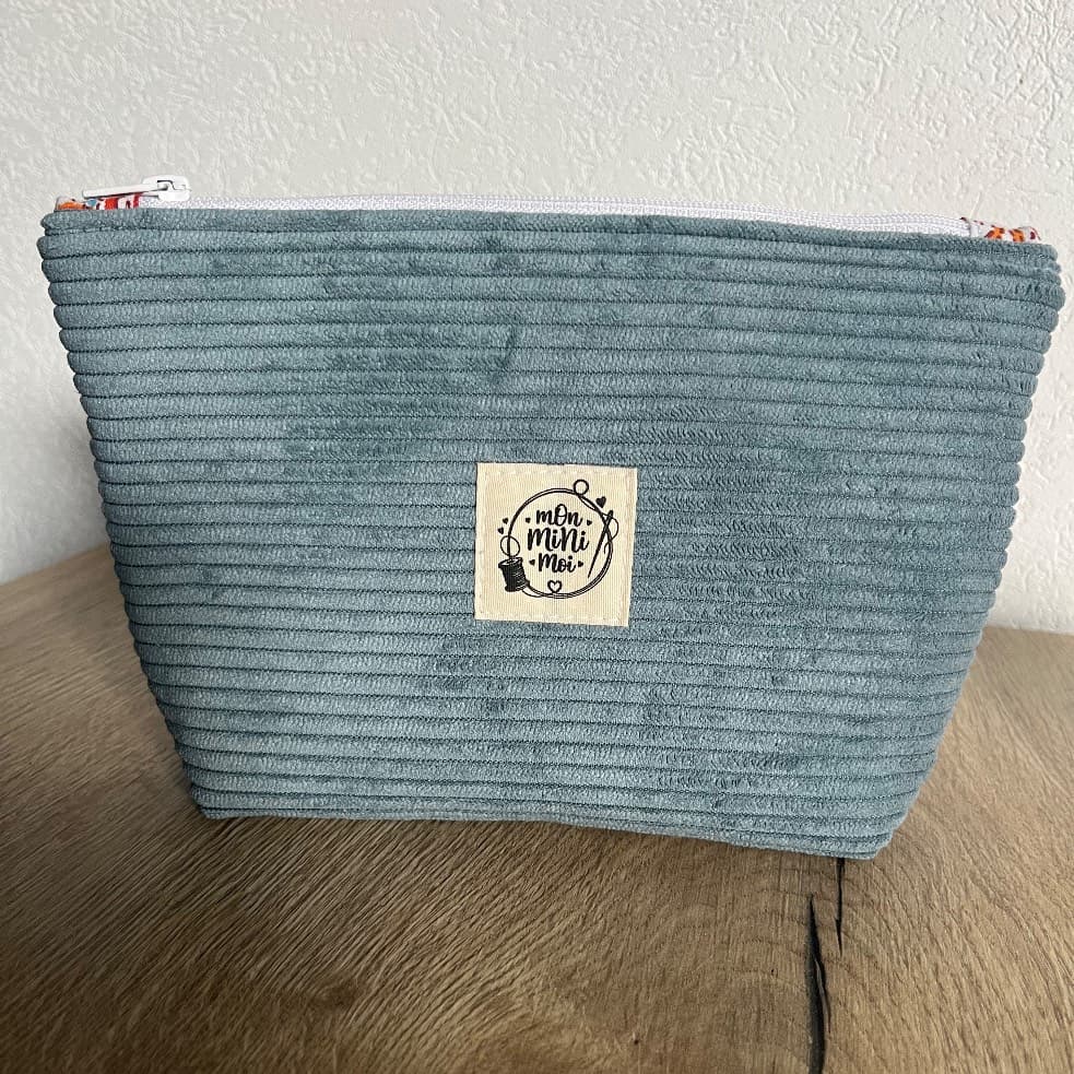 Trousse zippée à fond plat en velours côtelé bleu